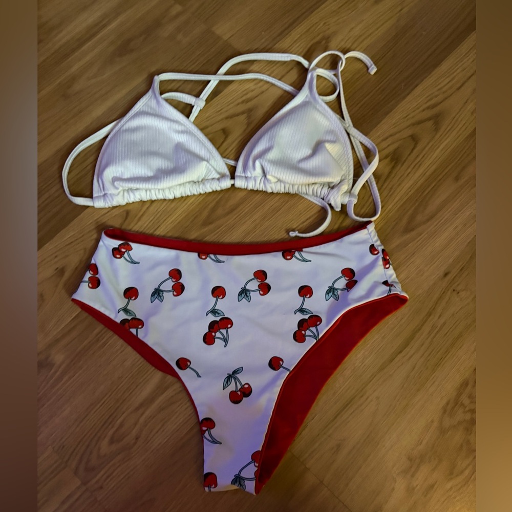 White top and cherry/red reversable bottoms.